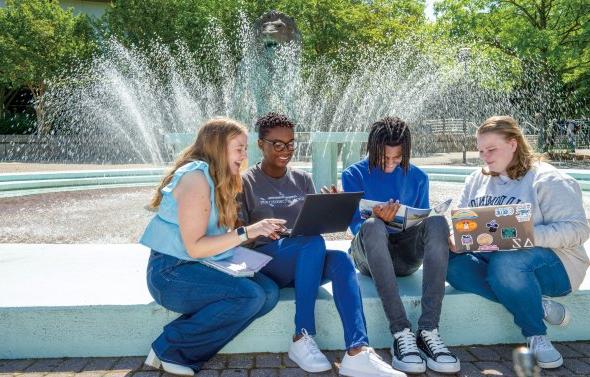 Students Studying by Fountain